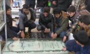 فیلم/جشن تکلیف دانش آموزان پسر راوری در جوار آرامگاه حاج قاسم